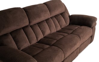 Brown plush fabric reclining sofa set with padded armrests and cushioned back support, featuring a built-in control panel for reclining functions.