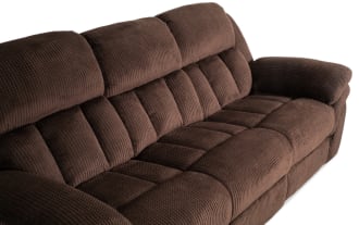 Brown plush fabric reclining sofa and armchair set with padded armrests and cushioned back support, designed for living room comfort.