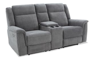 Gray fabric reclining loveseat with center console and cup holders, featuring padded armrests and cushioned back support for living room comfort.