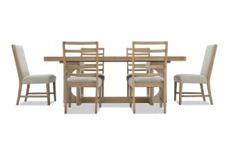 Dining set with a rectangular wooden table and six chairs, featuring light beige upholstered seats and backs, modern rustic style.