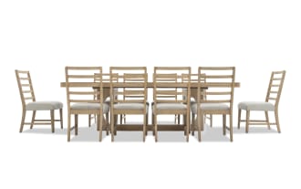 Dining set with a rectangular wooden table and eight ladder-back chairs featuring light beige upholstered seats and natural wood finish.