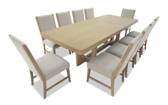 Dining set with a large rectangular wooden table and ten beige upholstered chairs featuring wooden legs and high backs, suitable for modern dining rooms.