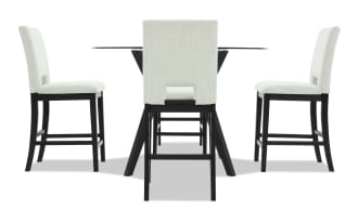 Modern dining set featuring a round glass table with black wooden legs and four upholstered beige fabric chairs with black wooden frames.