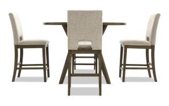 Dining set with three beige upholstered fabric chairs featuring wooden legs and a matching round wooden table, ideal for modern home decor.