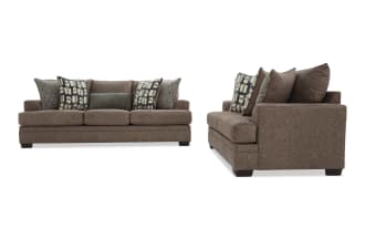 Brown fabric sofa with three seat cushions and five decorative pillows, featuring a modern design and dark wooden legs, shown from front and side views.