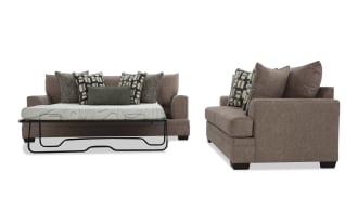 Brown fabric sofa sleeper with geometric and textured throw pillows, featuring a pull-out mattress and sturdy black metal frame, modern style.