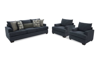 Dark blue fabric living room set featuring a three-seat sofa with patterned and solid throw pillows, and two matching armchairs with plush cushions and wooden legs.