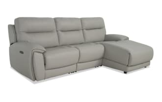 Illusion Gray Leather 110" power reclining 3-piece sectional with right arm chaise, armless power recliner, power headrest, and gray leather upholstery.