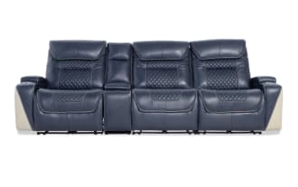 Three-seat navy blue leather recliner sofa with diamond-pattern stitching, beige side panels, and built-in cup holders, modern style.