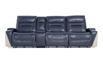 Modern navy blue leather reclining home theater sofa with quilted backrests, white accent panels, and built-in center console.