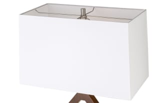 Modern table lamp with a rectangular white fabric shade, geometric wooden open-frame base, and brushed metal rectangular stand.