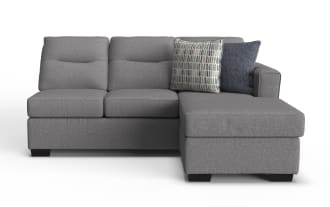 Dylan Slate right arm facing sleeper sofa and chaise kit in gray polyester fabric, transitional style with plush cushions and two decorative pillows.