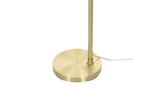 Brass floor lamp with a curved arm and white conical fabric shade, featuring a round metal base for living room or office lighting.