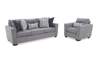 Gray fabric sofa with dark wooden legs, featuring three seat cushions and six decorative pillows in blue and gray patterns, shown from front and side views.