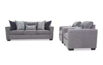 Modern gray fabric sofa and two matching armchairs with dark wooden legs and patterned throw pillows, ideal for contemporary living rooms.