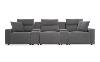 Modern gray fabric reclining sectional sofa with three seats, padded armrests, and two matching throw pillows, ideal for living room comfort.