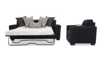 Dark gray fabric sleeper sofa with pull-out metal frame mattress, featuring multiple patterned and solid throw pillows, shown from front and side angles.