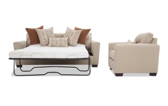 Beige fabric sleeper sofa with a metal frame pull-out bed, featuring patterned and solid rust-colored throw pillows, shown from front and side views.