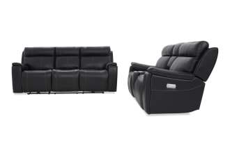 Black leather reclining sofa set with three seats, visible stitching, padded armrests, and side control panel for reclining functions.