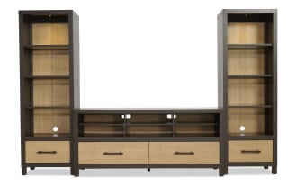 Modern entertainment center with dark brown frame and light wood paneling, featuring open shelves, drawers, and cable management holes for TV and media storage.