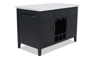 Black wooden kitchen island with white marble countertop, three drawers, two cabinets, and central wine rack storage.
