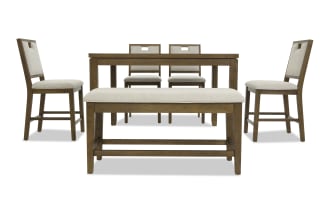 Dining set with a rectangular wooden table, four beige upholstered chairs, and a matching bench with cushioned seat, featuring a modern rustic design.
