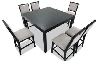 Black wooden dining table set with six beige upholstered chairs, featuring a modern design with square table and cushioned seats, ideal for dining rooms.