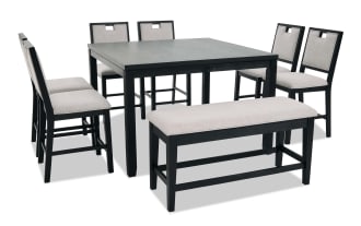 Black wooden dining table set with six cushioned chairs and a matching bench, featuring light beige upholstery and modern square design.