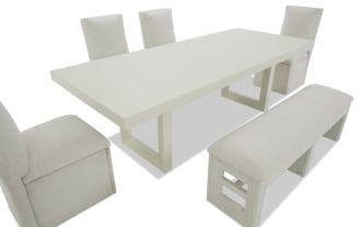 Dining set with a white rectangular extendable table, two beige upholstered side chairs, two matching chairs at the back, and a cushioned bench with white wooden legs.