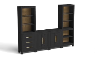 Black wooden modular storage unit with brass handles, featuring open shelves with wood grain backing, drawers, and closed cabinets for versatile home organization.