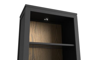 Black wooden entertainment center with matte finish, featuring two tall open shelves with warm wood backing, four double-door cabinets, and three central drawers with gold handles. Designed for living room storage and media organization.