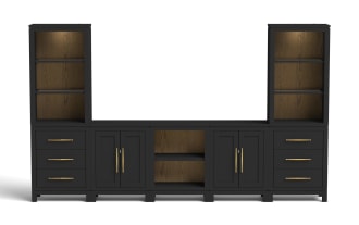 Black wooden entertainment center with matte finish, featuring two tall open shelving units with warm wood back panels, three drawers with gold handles on each side, two double-door cabinets with gold vertical handles, and a central open shelf area, designed for living room storage and media organization.
