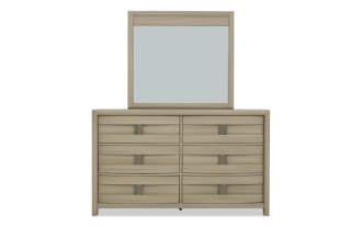 Light wood dresser with six drawers and matching rectangular mirror, featuring a modern design with integrated handles, ideal for bedroom storage.