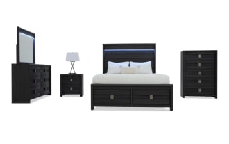 Modern black wood bedroom set with a queen bed, dresser with mirror, nightstand, chest of drawers, and white bedding.