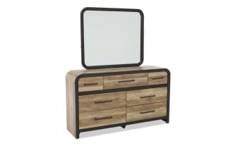 Wooden dresser with six drawers and three smaller top drawers, featuring black metal handles and a matching rectangular mirror with rounded corners, ideal for bedroom storage and decor.