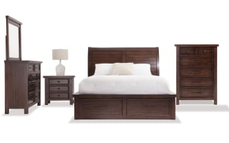 Hudson 5 Piece King Pecan Storage Platform Bedroom Set in transitional style, featuring a paneled sleigh bed with six storage drawers, dresser with mirror, chest, and nightstand with power outlets and USB ports. Made from rubberwood, pine solids, MDF, mango veneers, plywood, and pewter hardware in a warm pecan finish.