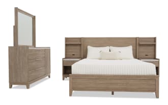 Modern bedroom set featuring a light brown wood finish king bed with built-in nightstands and a matching dresser with mirror, showcasing clean lines and a minimalist design.