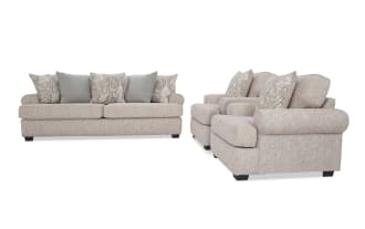 Beige fabric living room sofa set with rolled arms, dark wooden legs, and decorative patterned and solid throw pillows, ideal for modern home decor.