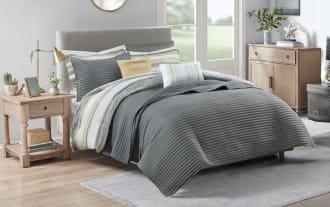 Lucas King/California King Gray 8 Piece Comforter Set in coastal style with white, gray, and yellow stripes, made of polyester microfiber for a lightweight, soothing bedroom look.