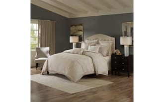 Humphrey Queen Ivory Geometric 8 Piece Comforter Set in tan and brown polyester fabric, featuring textured geometric patterns, decorative pillows with embroidery and weave designs, removable comforter insert, and button fastening for a glam bedroom update.
