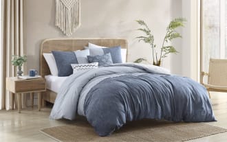 Hanover King Blue Striped 5 Piece Comforter Set in soft cotton-polyester chambray fabric, featuring denim-like fringe and embroidered blue accent pillows for a transitional bedroom style.