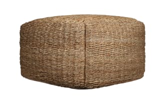 Round Esme Brown Pouf in farmhouse style, handcrafted from woven jute in warm brown tones, ideal as footrest or extra seating.