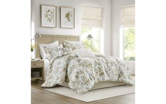 Botanical Bliss King Ivory 6 Piece Comforter Set with nature-inspired floral print in beige, brown, green, blue. Cotton-polyester blend, down-alternative, dash-stitched for cozy, clump-free warmth. Contemporary style with oversized coverage and removable pillow inserts for easy care.