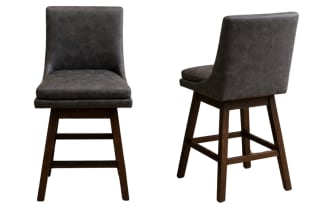 Set of 2 Elio Gray transitional faux leather swivel stools with solid backs, rubberwood legs, and cushioned graphite gray seats for counter height use.