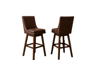 Set of 2 Elio Brown faux leather swivel bar stools with dark chocolate upholstery, solid back, rubberwood legs, and transitional style.