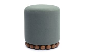 Addyson olive green ottoman with contemporary design, plush polyester fabric upholstery, and distinctive brown rubberwood orb base for stylish seating or footrest.