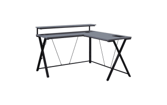 Chuck Gray L-Shaped Gaming Desk in gray MDF and black steel with built-in power outlet, dual USB ports, wireless charger, LED lights, monitor shelf, cup holder, and accessory hook.