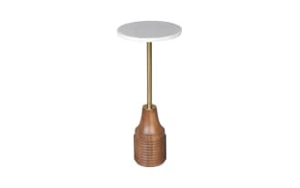 Modern side table with a round white marble top, supported by a slim brass rod and a carved wooden base in natural brown finish.