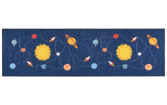 Orbit Adventure 2' x 6' blue runner rug with playful space design, navy background, yellow suns, red rockets, and synthetic polyamide fabric.