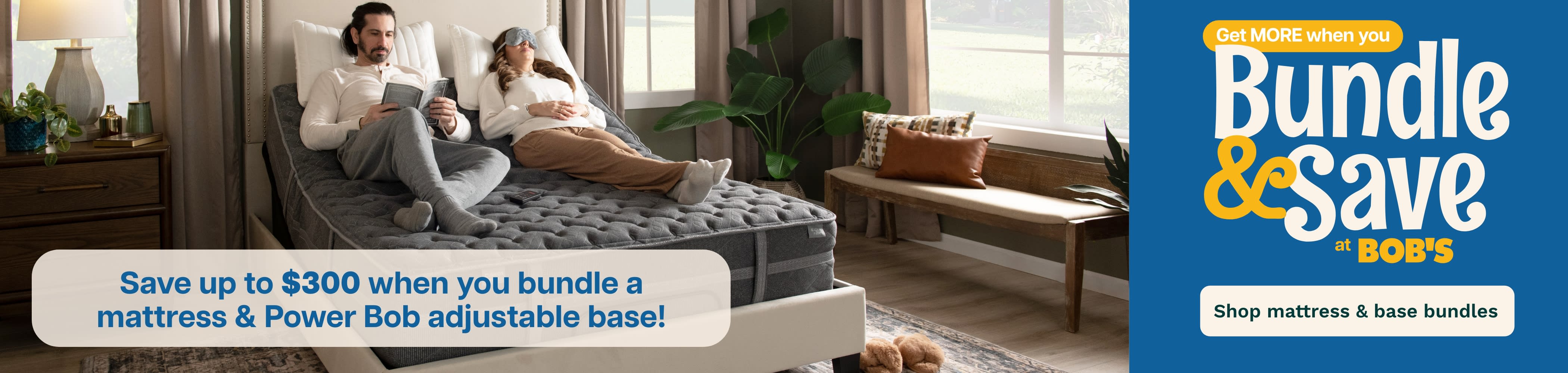 Couple relaxing on a gray quilted mattress with adjustable base in a modern bedroom. Text: "Save up to $300 when you bundle a mattress & Power Bob adjustable base! Get MORE when you Bundle & Save at BOB'S. Shop mattress & base bundles."